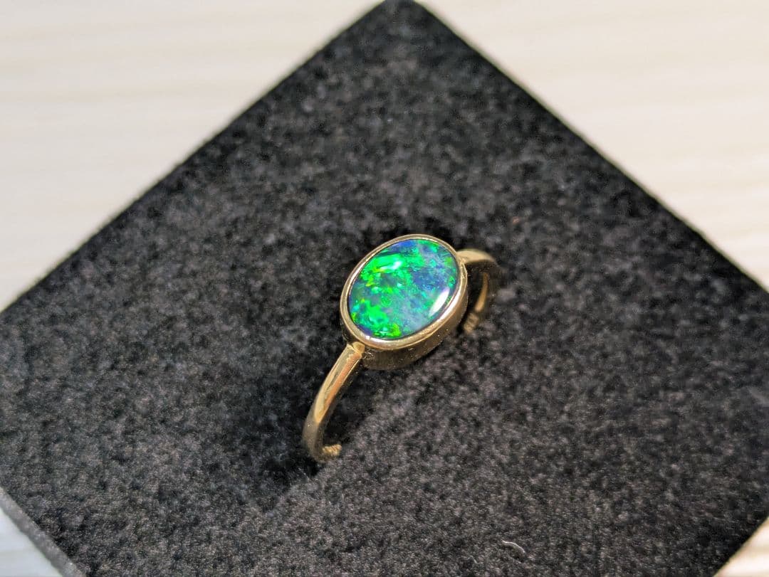 K18 0.77ct 12号 ボルダーオパールリング