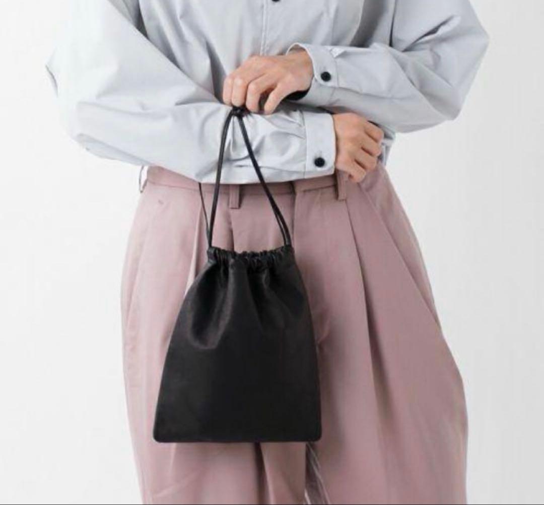 Aeta アエタ DOUBLE FACED DRAWSTRING POUCH L - メルカリ