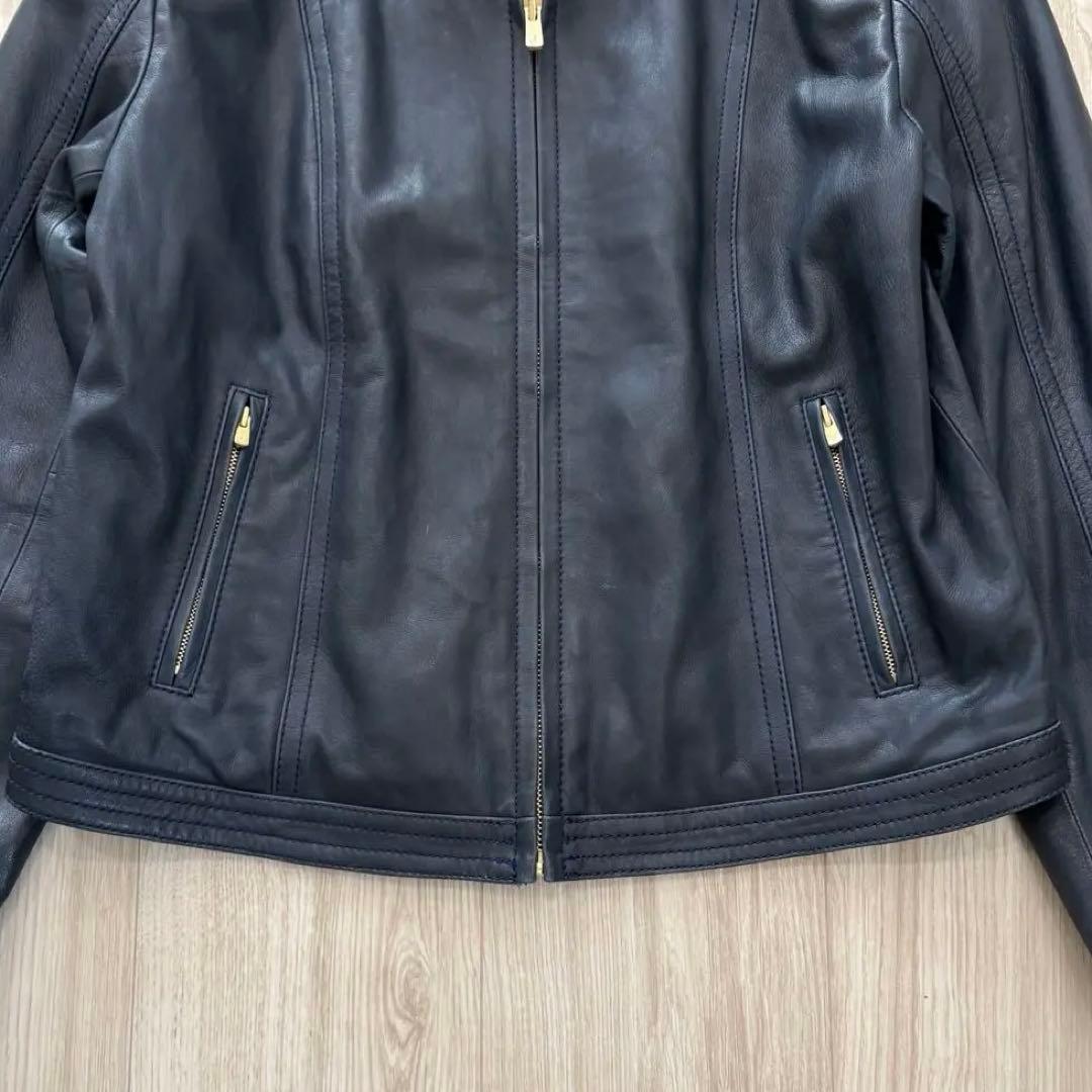 美品】23AW TOMORROWLAND レザージャケット 40 ネイビー - メルカリ